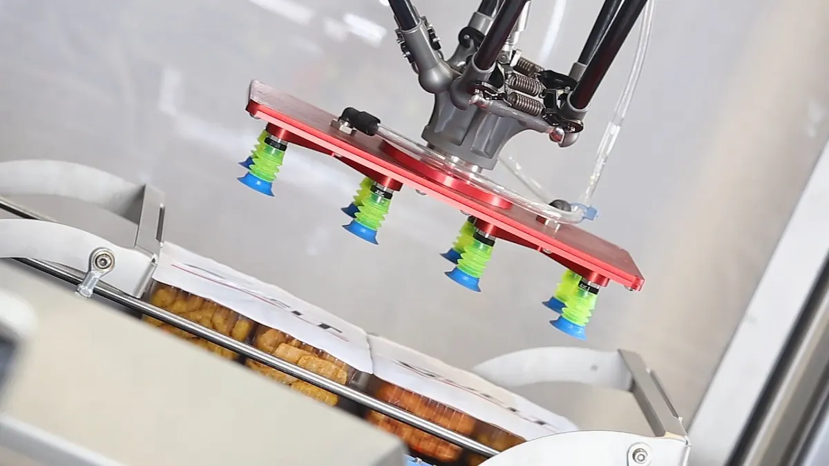 Préhension robotisée de produits sur une ligne de conditionnement